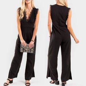 Black jumpsuit with lace around collar size small